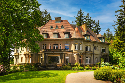Portland, Oregon, USA - June 5, 2022: Pittock Mansion in Portland. Originally built in 1909, Pittock mansion is a French Renaissance-style chateau located in the West Hills of the city.