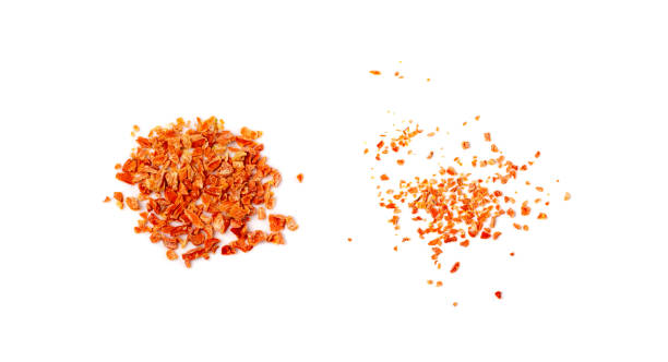 istock Dried Chopped Carrots Isolated on White Top View 1735075883