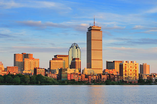 Boston Boston city skyline with Prudential Tower and urban skyscrapers over Charles River. prudential tower stock pictures, royalty-free photos & images