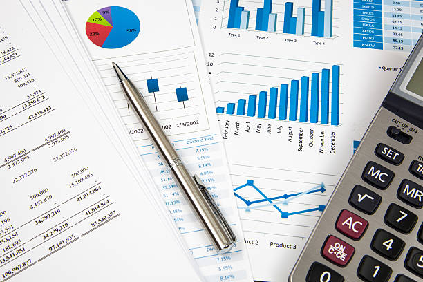 istock Financial paper charts and graphs 173508229