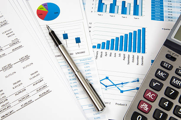 istock Financial paper charts and graphs 173508271