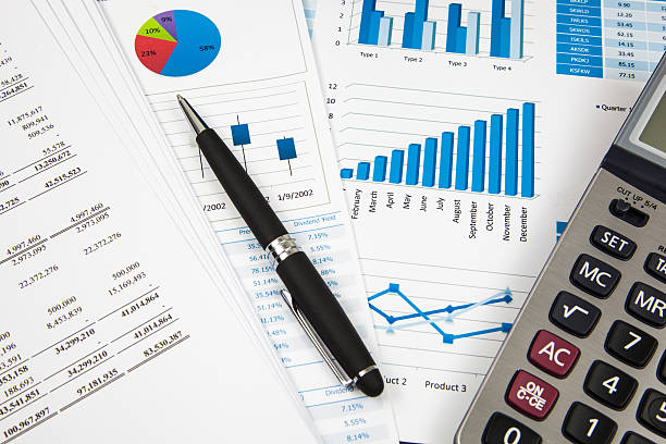 istock Financial paper charts and graphs 173508279