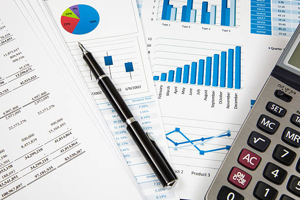 istock Financial paper charts and graphs 173508294