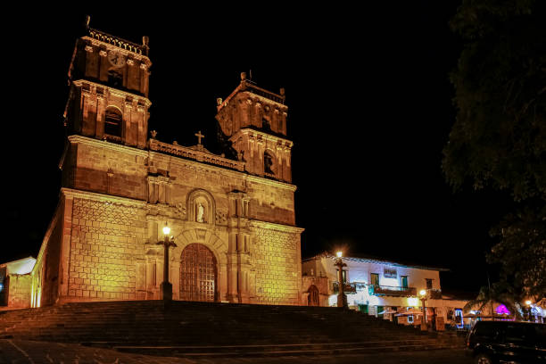 istock Historic Cathedral of the immaculate conception illuminated at night, view from left angle, Barichara, Colombia 1735120814