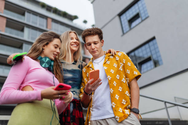 istock Generation z students hanging out together outdoors in the city. 1735128849