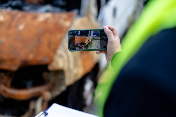 istock Thoroughly photographing vehicle damage with a mobile phone 1735188490