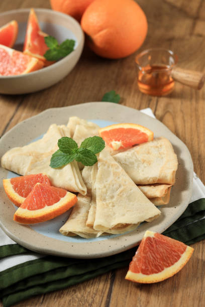 istock Crepes Suzette, Thin Pancakes with Orange Sauce 1735230268