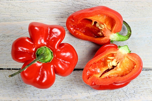 red habaneros on wooden background