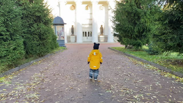 child walking along the footpath to the Orthodox Church, Ascension Cathedral