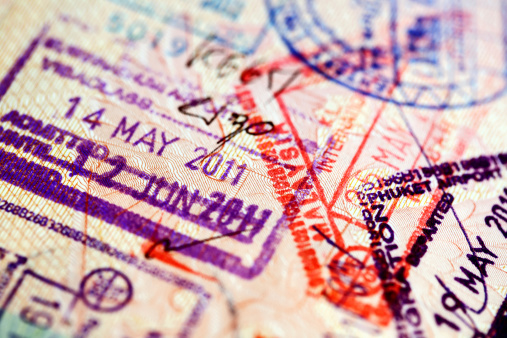Close-up of passport with various stamps (Thailand, Malaysia, S.Korea)