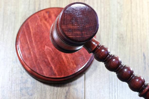 istock wooden gavel above sound block 1735353017