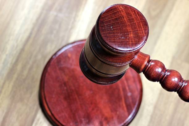 istock wooden gavel above sound block 1735353018
