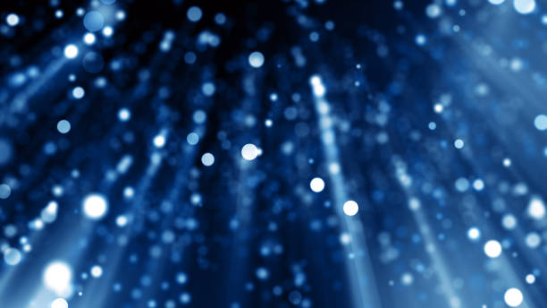 istock Particles Blue dust abstract light bokeh motion titles cinematic background 1735375743
