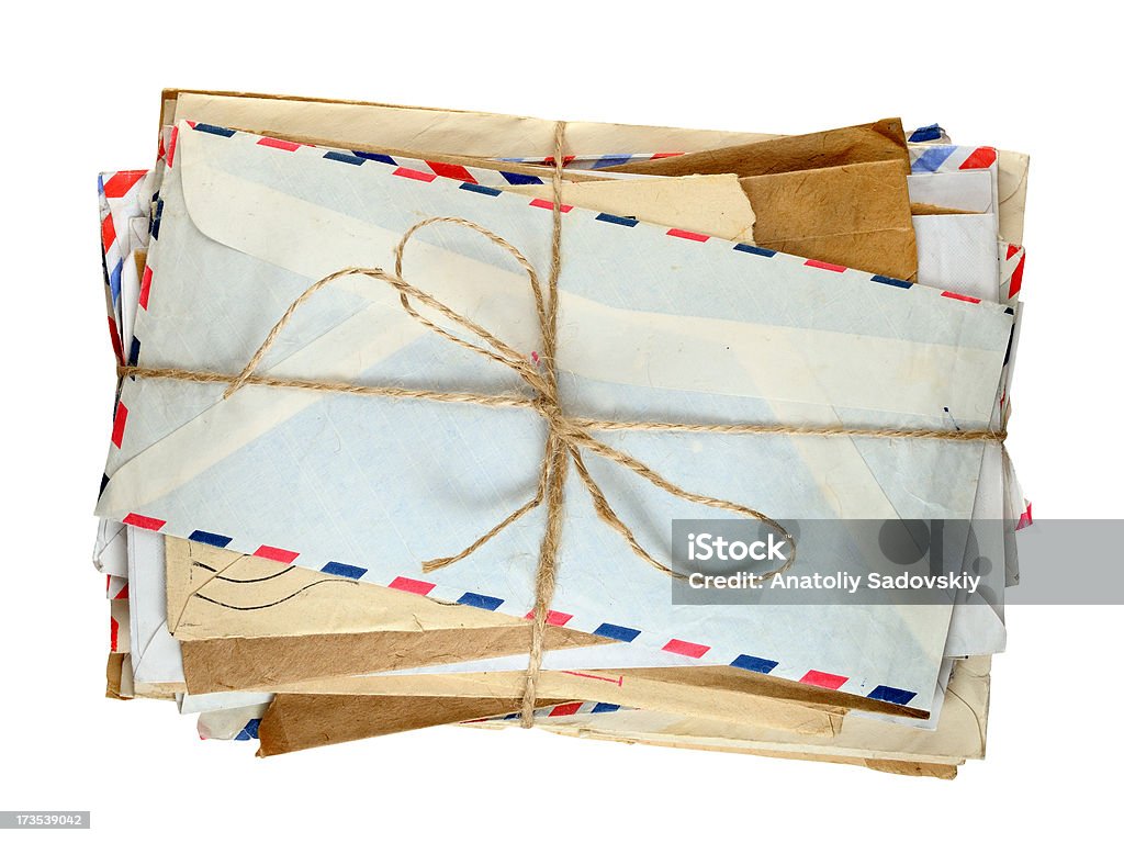 Pile of old envelopes isolated Pile of old envelopes isolated on white background Letter - Document Stock Photo