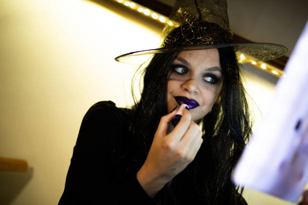 istock Young woman is preparing for a Halloween party 1735398561