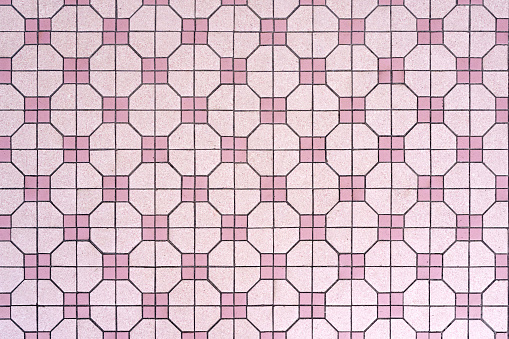 Mosaic floor featuring square and octagon pink tiles as the background