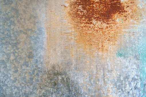 Close-up of a rusty galvanized gray zinc plate texture background