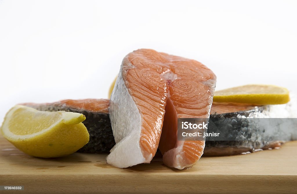 salmon sliced salmon on a board with lemon Catch of Fish Stock Photo