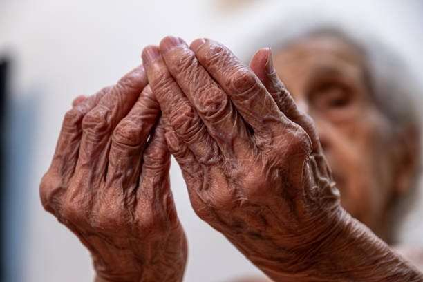 istock Old woman hands praying for god rising her hands 1735403681