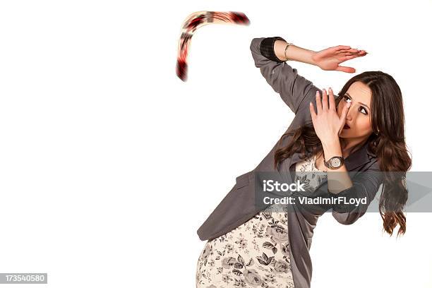 Woman Shielding Herself From Flying Boomerang Stock Photo - Download Image Now - Boomerang, One Woman Only, Women