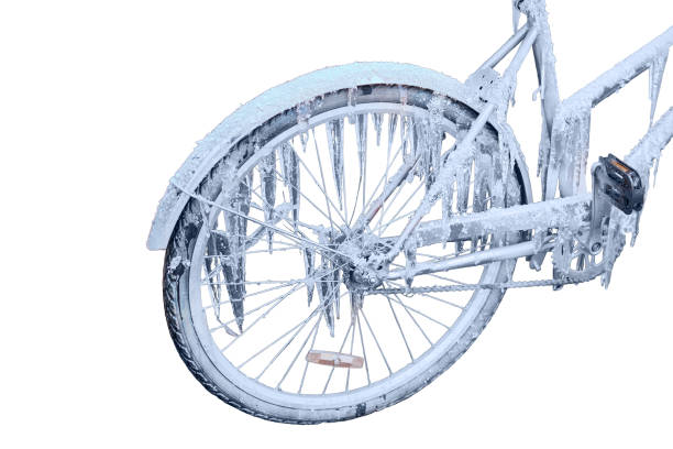 Iced bike with icicles, isolated on a white background