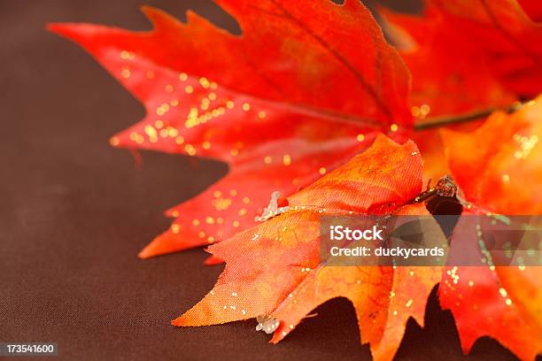 Fall Leaves On Brown Background Stock Photo - Download Image Now - Artificial, Autumn, Backgrounds