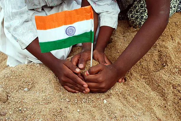 children giving support to the Indian flag....