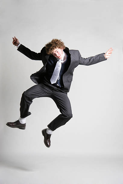 istock Business man jump for joy 173543561