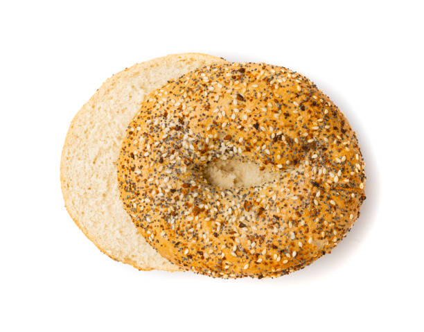istock Bagel, Round Bread Bun, Wheat Bakery with Grains And Seeds for Breakfast, Plain Circle Bagel Bread 1735440569