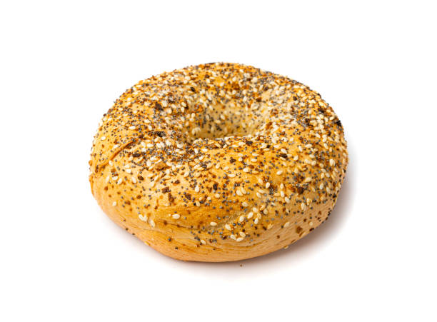 istock Bagel, Round Bread Bun, Wheat Bakery with Grains And Seeds for Breakfast, Plain Circle Bagel Bread 1735440593