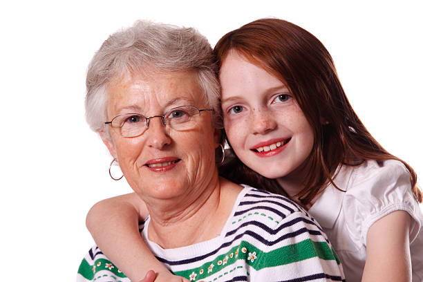 Cute little girl hugging her Grandmother