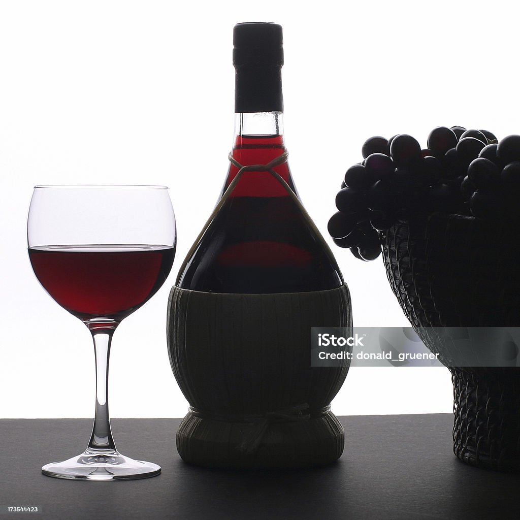 Chianti Composition Square, graphic composition including typical bottle of chianti with glass & grapes in basket Chianti Region Stock Photo