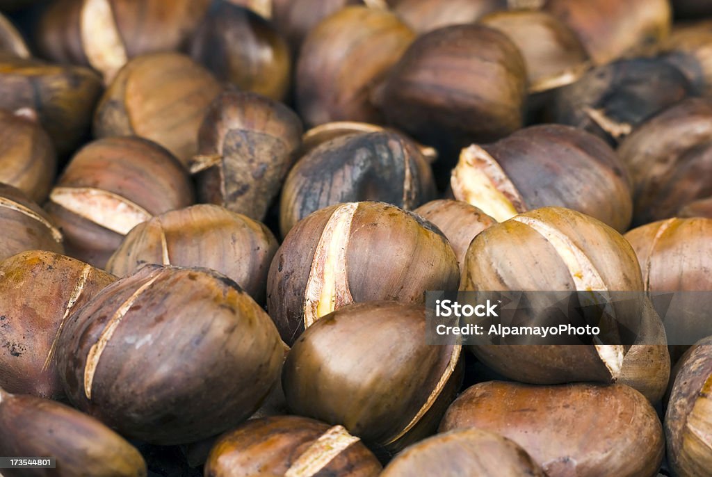 Roasting chestnuts - III  Chestnut - Food Stock Photo