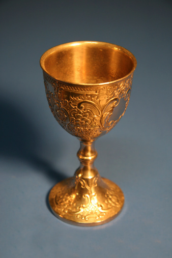 An ornate chalise in golden light.