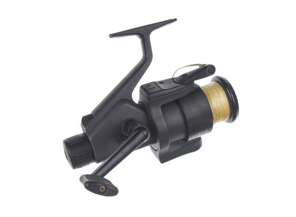 istock Fishing  reel close up isolated on a white background 1735454093