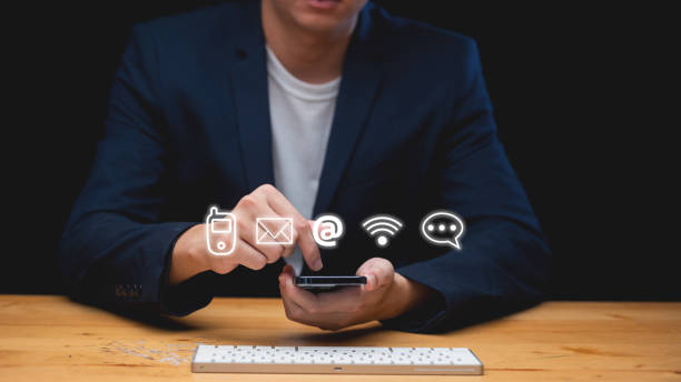 istock Customer support hotline Contact us people connection. Businessman using computer keyboard with the email, call phone, address, Chat message icons. 1735463294
