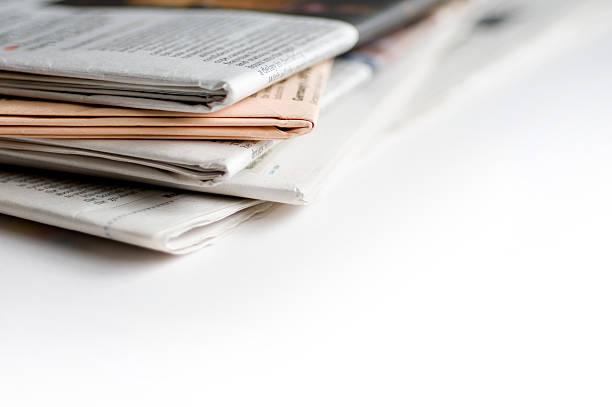 istock Close up photo of a stack of newspapers 173546572