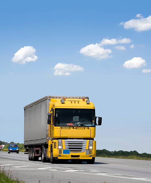 istock Blue sky over yellow truck 173546848