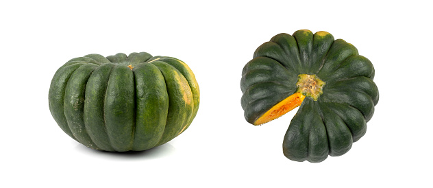 Green pumpkin isolated, sweet kabocha round squash, whole acorn pumpkin on white background top view