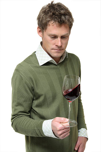 istock Man Swirls Red Wine 173547327