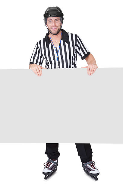 istock Portrait of hockey judge presenting empty banner 173547342