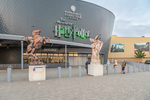 Entrance to the Harry Potter Studios with chess piece statues, Leavesden, Hertfordshire, England