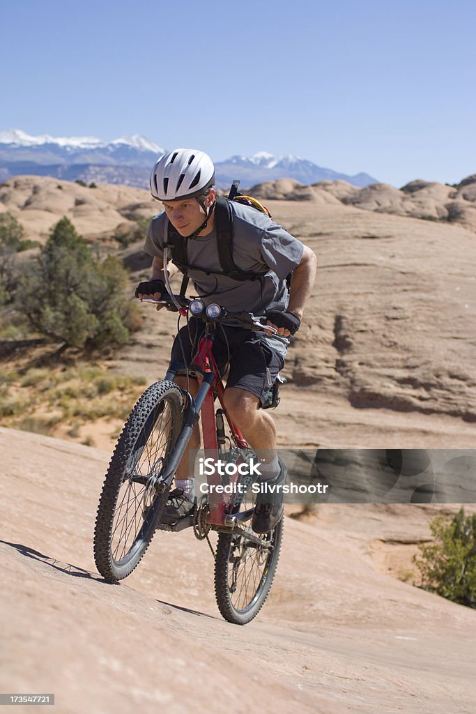 Mountain Biking the Slickrock Trail in Moab Utah "Mountain biking the slickrock trail in Moab, UT." Activity Stock Photo