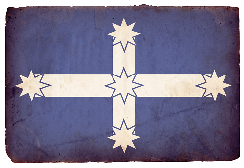 Image of an old, grungy piece XXXL paper isolated against a white background with Australia's Eureka flag overlayed on top. Great background file/design element. Flag is easily removed from white background with Photoshop's wand tool. See more quality images like this in my Grunge XXXL Flag lightbox and in my portfolio.
