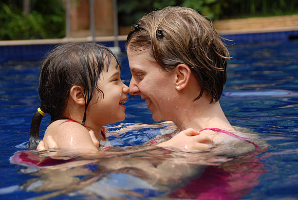Together in the pool stock photo