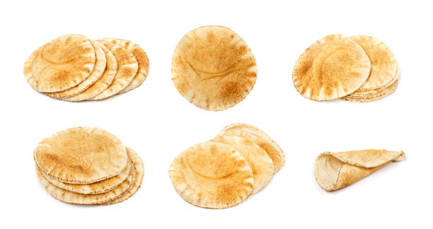 Wheaten Pita Flat Bread Stack Isolated, Flatbread, Chapati, Naan, Tortilla on White Background Wheaten Pita Flat Bread Stack Isolated. Flatbread also known as Pita Bread, Chapati, Naan, Tortilla Pile on White Background pita bread isolated stock pictures, royalty-free photos & images