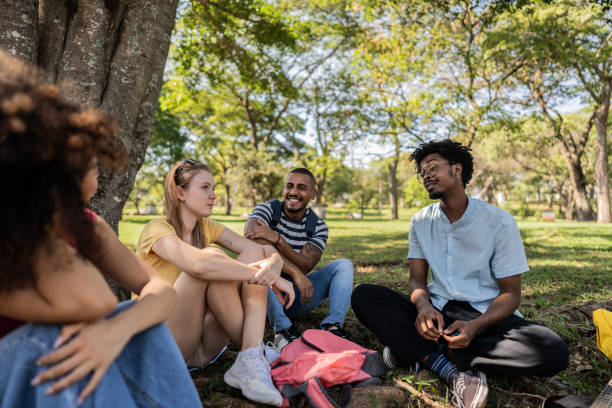 istock Student friends talking at university campus outdoors 1735500961