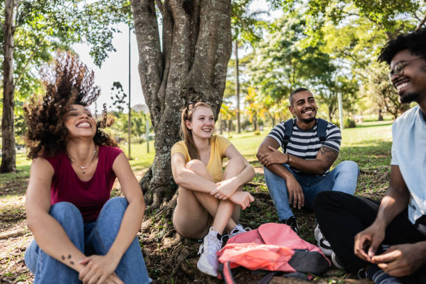 istock Student friends talking at university campus outdoors 1735500963