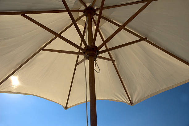 istock Beach umbrella raised in the sun 173550306