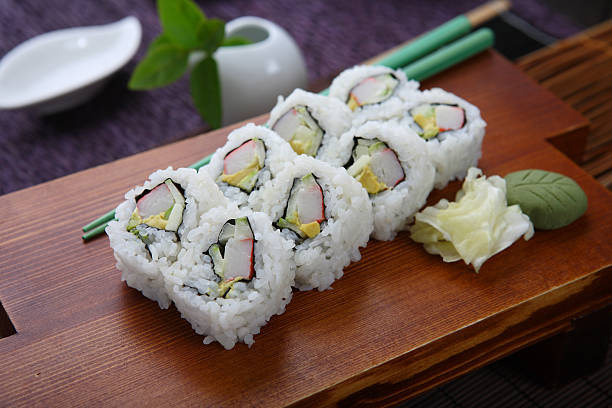 istock California Roll on wooden board 173550603